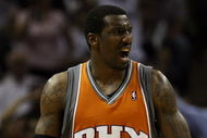 SAN ANTONIO - APRIL 22:  Center Amare Stoudemire #1 of the Phoenix Suns reacts against the San Antonio Spurs in Game Two of the Western Conference Quarterfinals during the 2008 NBA Playoffs at the AT&T Center on April 22, 2008 in San Antonio, Texas. NOTE TO USER: User expressly acknowledges and agrees that, by downloading and or using this photograph, User is consenting to the terms and conditions of the Getty Images License Agreement. (Photo by Ronald Martinez/Getty Images)