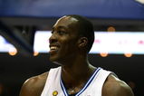 ORLANDO, FL - JUNE 14:  Dwight Howard #12 of the Orlando Magic smiles in the first half against the Los Angeles Lakers in Game Five of the 2009 NBA Finals on June 14, 2009 at Amway Arena in Orlando, Florida.  NOTE TO USER:  User expressly acknowledges and agrees that, by downloading and or using this photograph, User is consenting to the terms and conditions of the Getty Images License Agreement.  (Photo by Elsa/Getty Images)