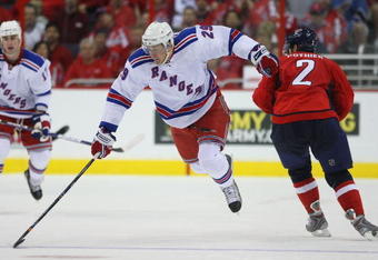 WASHINGTON - APRIL 18:  Lauri Korpikoski #29 of the New York Rangers skates past Brian Pothier #2 of the Washington Capitals during Game Two of the Eastern Conference Quarterfinal Round of the 2009 NHL Stanley Cup Playoffs at Verizon Center on April 18, 2009 in Washington, DC.  (Photo by Bruce Bennett/Getty Images)