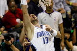 ORLANDO, FL - JUNE 14:  Marcin Gortat #13 of the Orlando Magic puts a shot up in Game Five of the 2009 NBA Finals against the Los Angeles Lakers on June 14, 2009 at Amway Arena in Orlando, Florida.  The Lakers won 99-86.  NOTE TO USER:  User expressly acknowledges and agrees that, by downloading and or using this photograph, User is consenting to the terms and conditions of the Getty Images License Agreement.  (Photo by Chris Graythen/Getty Images)