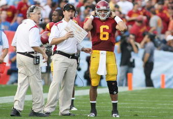 PASADENA, CA - DECEMBER 6:  Head coach Pete Carroll, offensive coordinator Steve Sarkisian and quarterback Mark Sanchez #6 of the USC Trojans look on during a timeout against the UCLA Bruins on December 6, 2008 at the Rose Bowl in Pasadena, California.  USC won 28-7.  (Photo by Jeff Golden/Getty Images)