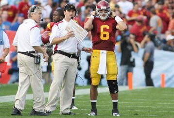 PASADENA, CA - DECEMBER 6:  Head coach Pete Carroll, offensive coordinator Steve Sarkisian and quarterback Mark Sanchez #6 of the USC Trojans look on during a timeout against the UCLA Bruins on December 6, 2008 at the Rose Bowl in Pasadena, California.  USC won 28-7.  (Photo by Jeff Golden/Getty Images)