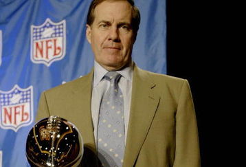HOUSTON - JANUARY 30:  New England Patriots head coach Bill Belichick poses with the Vince Lombardi trophy after a press conference on January 30, 2004 at the Hilton Hotel in Houston, Texas. (Photo by Jeff Gross/Getty Images)