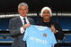 MANCHESTER, ENGLAND - JULY 14:  Mark Hughes, manager of Manchester City, poses with Carlos Tevez after he signed for Manchester City at City of Manchester Stadium on July 14, 2009 in Manchester, England.  (Photo by Matthew Lewis/Getty Images)