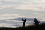 TURNBERRY, SCOTLAND - JULY 15:  Adam Scott of Australia hits his second shot on the 9th hole during a practice round prior to the 138th Open Championship on the Ailsa Course, Turnberry Golf Club on July 15, 2009 in Turnberry, Scotland.  (Photo by Andrew Redington/Getty Images)