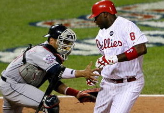 ST LOUIS, MO - JULY 14:  National League All-Star Ryan Howard of the Philadelphia Phillies is tagged out after striking out by American League All-Star Victor Martinez of the Cleveland Indians during the 2009 MLB All-Star Game at Busch Stadium on July 14, 2009 in St Louis, Missouri.  (Photo by Elsa/Getty Images)