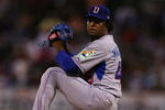SAN JUAN, PUERTO RICO - MARCH 10:  Pedro Martinez #45 of The Dominican Republic pitches against The Netherlands during the 2009 World Baseball Classic Pool D match on March 10, 2009 at Hiram Bithorn Stadium in San Juan, Puerto Rico.  (Photo by Al Bello/Getty Images)