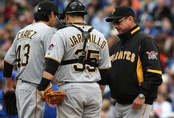 CHICAGO - MAY 27: Manager John Russell #7 of the Pittsburgh Pirates (R) takes pitcher Jesse Chavez #43 out of a game against the Chicago Cubs as catcher Jason Jaramillo #35 watches on May 27, 2009 at Wrigley Field in Chicago, Illinois. The Cubs defeated the Pirates 5-2. (Photo by Jonathan Daniel/Getty Images) 