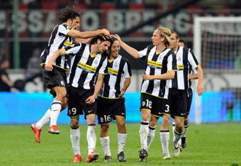 MILAN, ITALY - MAY 10:  Vincenzo Iaquinta of FC Juventus celerbrates with Christian Poulsen after scoring  during the Serie A match between FC Juventus and  AC Milan at the Meazza Stadium on May 10, 2009 in Milan, Italy.  (Photo by Claudio Villa/Getty Images)
