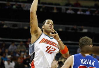 CHARLOTTE, NC - FEBRUARY 9:  Sean May #42 of the Charlotte Bobcats puts up a shot during the game against the Los Angeles Clippers at Time Warner Cable Arena on February 9, 2009 in Charlotte, North Carolina. NOTE TO USER: User expressly acknowledges and agrees that, by downloading and or using this photograph, User is consenting to the terms and conditions of the Getty Images License Agreement. (Photo by Streeter Lecka/Getty Images) 