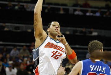 CHARLOTTE, NC - FEBRUARY 9:  Sean May #42 of the Charlotte Bobcats puts up a shot during the game against the Los Angeles Clippers at Time Warner Cable Arena on February 9, 2009 in Charlotte, North Carolina. NOTE TO USER: User expressly acknowledges and agrees that, by downloading and or using this photograph, User is consenting to the terms and conditions of the Getty Images License Agreement. (Photo by Streeter Lecka/Getty Images) 
