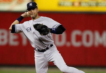 ST LOUIS, MO - JULY 14:  American League All-Stars Derek Jeter of the New York Yankees throws to first during the 2009 MLB All-Star Game at Busch Stadium on July 14, 2009 in St Louis, Missouri.  (Photo by Dilip Vishwanat/Getty Images)
