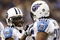 DETROIT , MI - NOVEMBER 27:  LenDale White #25 of the Tennessee Titans celebrates a second quarter touchdown with Chris Johnson #28 while playing the Detroit Lions on November 27, 2008 at Ford Field in Detroit, Michigan.  (Photo by Gregory Shamus/Getty Images)