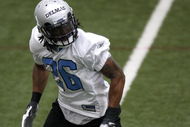 ALLEN PARK, MI - MAY 01:  Louis Delmas #26 of the Detroit Lions looks for a pass during rookie orientation camp at the Detroit Lions Headquarters and Training Facility on May 1, 2009 in Allen Park, Michigan.  (Photo by Gregory Shamus/Getty Images)