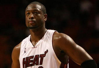 MIAMI - APRIL 27:  Dwyane Wade #3 of the Miami Heat reacts with less than a minute to play in the game against the Atlanta Hawks during Game Four of the Eastern Conference Quarterfinals of the 2009 NBA Playoffs at American Airlines Arena on April 27, 2009 in Miami, Florida. The Hawks defeated the Heat 81-71. NOTE TO USER: User expressly acknowledges and agrees that, by downloading and/or using this Photograph, user is consenting to the terms and conditions of the Getty Images License Agreement.  (Photo by Doug Benc/Getty Images)