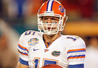 MIAMI - JANUARY 08:  Tim Tebow #15 of the Florida Gators looks to the sidelines against the Oklahoma Sooners during the FedEx BCS National Championship Game at Dolphin Stadium on January 8, 2009 in Miami, Florida.  (Photo by Eliot J. Schechter/Getty Images