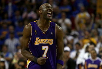 ORLANDO, FL - JUNE 14:  Lamar Odom #7 of the Los Angeles Lakers celebrates after defeating the Orlando Magic 99-86 in Game Five of the 2009 NBA Finals on June 14, 2009 at Amway Arena in Orlando, Florida.  NOTE TO USER:  User expressly acknowledges and agrees that, by downloading and or using this photograph, User is consenting to the terms and conditions of the Getty Images License Agreement.  (Photo by Elsa/Getty Images)