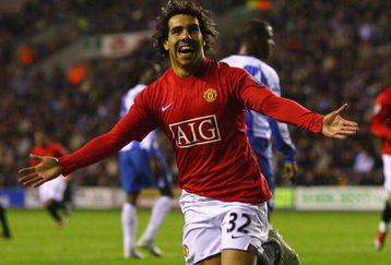 WIGAN, ENGLAND - MAY 13:  Carlos Tevez of Manchester United celebrates after scoring the equalizing goal during the Barclays Premier League match between Wigan Athletic and Manchester United at the JJB Stadium on May 13, 2009 in Wigan, England.  (Photo by Alex Livesey/Getty Images)