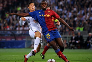 ROME - MAY 27:  Cristiano Ronaldo of Manchester United battles for the ball with Yaya Toure of Barcelona during the Champions League Final match between Barcelona and Manchester United at the Stadio Olimpico on May 27, 2009 in Rome, Italy. Barcelona won 2-0.  (Photo by Shaun Botterill/Getty Images)