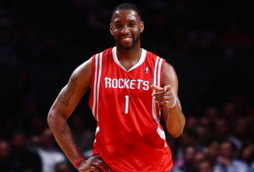 NEW YORK - JANUARY 26:  Tracy McGrady #1 of the Houston Rockets smiles against the New York Knicks on January 26, 2009 at Madison Square Garden in New York City.  NOTE TO USER: User expressly acknowledges and agrees that, by downloading and/or using this Photograph, User is consenting to the terms and conditions of the Getty Images License Agreement.  (Photo by Chris McGrath/Getty Images)