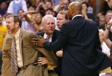 LOS ANGELES - MAY 15:  Assistant coaches PJ Carlisimo, Mario Elie and Mike Budenholzer hold back head coach Gregg Popovich of the San Antonio Spurs after a call during Game six of the Western Conference Semifinals against the Los Angeles Lakers during the 2004 NBA Playoffs at Staples Center on May 15, 2004 in Los Angeles, California.  NOTE TO USER: User expressly acknowledges and agrees that, by downloading and/or using this Photograph, user is consenting to the terms and conditions of the Getty Images License Agreement. Mandatory Copyright Notice: Copyright 2004 NBAE  (Photo by Stephen Dunn/Getty Images)