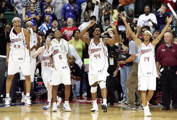 YPSILANTI, MI - OCTOBER 05:  Players of the Detroit Shock run off the bench after defeating the San Antonio Silver Stars in Game 3 of the WNBA Finals at the Eastern Michigan University Convocation Center on October 5, 2008 in Ypsilanti, Michigan. NOTE TO USER: User expressly acknowledges and agrees that, by downloading and or using this Photograph, User is consenting to the terms and conditions of the Getty Images License Agreement.  (Photo by Domenic Centofanti/Getty Images)