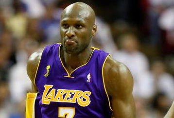 ORLANDO, FL - JUNE 14:  Lamar Odom #7 of the Los Angeles Lakers reacts in the third quarter against the Orlando Magic in Game Five of the 2009 NBA Finals on June 14, 2009 at Amway Arena in Orlando, Florida.  NOTE TO USER:  User expressly acknowledges and agrees that, by downloading and or using this photograph, User is consenting to the terms and conditions of the Getty Images License Agreement.  (Photo by Ronald Martinez/Getty Images)