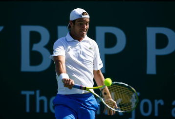 INDIAN WELLS, CA - MARCH 16:  Richard Gasquet of France returns a backhand to Fernando Verdasco during the BNP Paribas Open at the Indian Wells Tennis Garden on March 16, 2009 in Indian Wells, California.  (Photo by Jeff Gross/Getty Images)