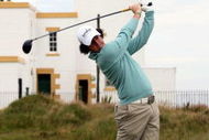 TURNBERRY, SCOTLAND - JULY 13:  Rory McIlroy of Northern Ireland plays on the 10th hole watched by Graeme McDowell during the practice round of the 138th Open Championship on July 13, 2009 on the Ailsa Course, Turnberry Golf Club, Turnberry, Scotland.  (Photo by Ross Kinnaird/Getty Images)
