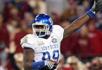 NASHVILLE - DECEMBER 31: Jeremy Jarmon #99 of the Kentucky Wildcats catches the ball during the Gaylord Hotels Music City Bowl against the Florida State Seminoles on December 31, 2007 at the LP Field in Nashville, Tennessee. (Photo by: Andy Lyons/Getty Images)