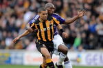 HULL, UNITED KINGDOM - MARCH 14:  Geovanni of Hull City (L) is challenged by Geremi of Newcastle United during the Barclays Premier League match between Hull City and Newcastle United at the KC Stadium on March 14, 2009 in Hull, England.  (Photo by Shaun Botterill/Getty Images)