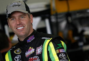DAYTONA BEACH, FL - FEBRUARY 14:  Jeremy Mayfield, driver of the #41 Allsport Toyota, stands in the garage area during practice for the NASCAR Sprint Cup Series Daytona 500 at Daytona International Speedway on February 14, 2009 in Daytona Beach, Florida.  (Photo by Chris Graythen/Getty Images)
