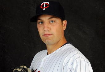 FORT MYERS, FL - FEBRUARY 23: Kevin Mulvey #61 of the Minnesota Twins poses during photo day at the Twins spring training complex on February 23, 2008 in Fort Myers, Florida. (Photo by Rob Tringali/Getty Images)