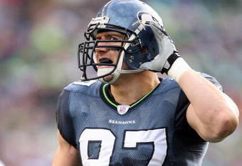 SEATTLE - JANUARY 05:  Defensive end Patrick Kerney #97 of the Seattle Seahawks listens from the field in the first quarter against the Washington Redskins during the NFC Wild Card game at Qwest Field on January 5, 2008 in Seattle, Washington.  (Photo by Otto Greule Jr/Getty Images)