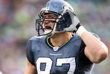 SEATTLE - JANUARY 05:  Defensive end Patrick Kerney #97 of the Seattle Seahawks listens from the field in the first quarter against the Washington Redskins during the NFC Wild Card game at Qwest Field on January 5, 2008 in Seattle, Washington.  (Photo by Otto Greule Jr/Getty Images)