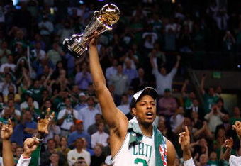 BOSTON - JUNE 17:  Paul Pierce #34 of the Boston Celtics celebrates with the Finals MVP trophy at the end of Game Six of the 2008 NBA Finals against the Los Angeles Lakers on June 17, 2008 at TD Banknorth Garden in Boston, Massachusetts. The Celtics defeated the Lakers 131-92 to win the NBA Championship.  NOTE TO USER: User expressly acknowledges and agrees that, by downloading and/or using this Photograph, user is consenting to the terms and conditions of the Getty Images License Agreement.  (Photo by Jim Rogash/Getty Images)