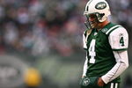 EAST RUTHERFORD, NJ - DECEMBER 14:  Brett Favre #4 of The New York Jets walks on the field against The Buffalo Bills during their game on December 14, 2008 at Giants Stadium in East Rutherford, New Jersey.  (Photo by Al Bello/Getty Images)