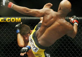 CHICAGO- OCTOBER 25:  Anderson Silva fights Patrick Cote in the Middleweight Title Bout at UFC's Ultimate Fight Night at Allstate Arena on October 25, 2008 in Chicago, Illinois. (Photo by Tasos Katopodis/Getty Images)