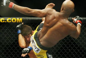 CHICAGO- OCTOBER 25:  Anderson Silva fights Patrick Cote in the Middleweight Title Bout at UFC's Ultimate Fight Night at Allstate Arena on October 25, 2008 in Chicago, Illinois. (Photo by Tasos Katopodis/Getty Images)
