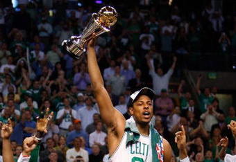 BOSTON - JUNE 17:  Paul Pierce #34 of the Boston Celtics celebrates with the Finals MVP trophy at the end of Game Six of the 2008 NBA Finals against the Los Angeles Lakers on June 17, 2008 at TD Banknorth Garden in Boston, Massachusetts. The Celtics defeated the Lakers 131-92 to win the NBA Championship.  NOTE TO USER: User expressly acknowledges and agrees that, by downloading and/or using this Photograph, user is consenting to the terms and conditions of the Getty Images License Agreement.  (Photo by Jim Rogash/Getty Images)