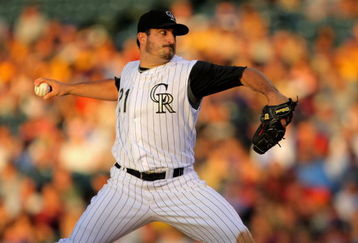 DENVER - JULY 06:  Starting pitcher Jason Marquis #21 of the Colorado Rockies delivers against the Washington Nationals during MLB action at Coors Field on July 6, 2009 in Denver, Colorado. Marquis earned the win as the Rockies defeated the Nationals 1-0.  (Photo by Doug Pensinger/Getty Images)