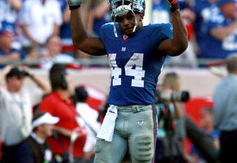 TAMPA, FL - JANUARY 06:  Ahmad Bradshaw #44 of the New York Giants celebrates as his team defeated the Tampa Bay Buccaneers 24-14 in the NFC Wild Card game at Raymond James Stadium on January 6, 2008 in Tampa, Florida.  (Photo by Doug Benc/Getty Images)