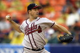 QUEENS, NY- SEPTEMBER 1:  Greg Maddux #31 of the Atlanta Braves pitches against the New York Mets during the game at Shea Stadium on September 1, 2003 in Queens, New York. The Mets defeated the Braves 3-2. (Photo by Chris Trotman/Getty Images)