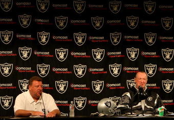 ALAMEDA, CA - SEPTEMBER 30: Oakland Raiders owner Al Davis and Tom Cable speak during a press conference after being named new head coach after the firing of Lane Kiffin of the Oakland Raiders at thier training facility on Septemer 30, 2008 in Alameda, California.  (Photo by Jed Jacobsohn/Getty Images)