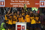 LIVERPOOL, ENGLAND - MAY 26:  The Arsenal team celebrate winning the FA Youth Cup during the second leg of the FA Youth Cup final sponsored by E.ON, between Liverpool and Arsenal at Anfield on May 26, 2009 in Liverpool, England.  (Photo by Jamie McDonald/Getty Images)