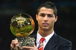 MANCHESTER, UNITED KINGDOM - DECEMBER 10:  Cristiano Ronaldo of Manchester United receives the Ballon d'or after being voted the European Footballer of the Year before the UEFA Champions League Group E match between Manchester United and Aalborg at Old Trafford on December 10, 2008 in Manchester, England.  (Photo by Alex Livesey/Getty Images)
