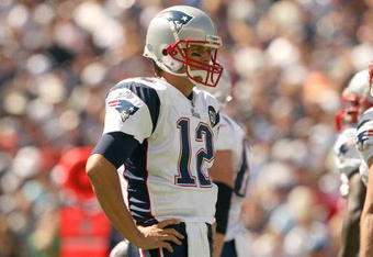 FOXBORO, MA - SEPTEMBER 7:  Quarterback #12 of the New England Patriots looks on during their NFL game against the Kansas City Chiefs on September 7, 2008 at Gillette Stadium in Foxboro, Massachusetts. The Patriots defeated the Chiefs 17-10. (Photo by Elsa Garrison/Getty Images)
