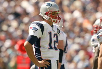 FOXBORO, MA - SEPTEMBER 7:  Quarterback #12 of the New England Patriots looks on during their NFL game against the Kansas City Chiefs on September 7, 2008 at Gillette Stadium in Foxboro, Massachusetts. The Patriots defeated the Chiefs 17-10. (Photo by Elsa Garrison/Getty Images)