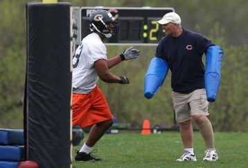 LAKE FOREST, IL - MAY 01: Defensive line coach Rob Marinelli of the Chicago Bears, former head coach of the Detroit Lions, works with Jarron Gilbert #73 during a rookie mini-camp practice on May 1, 2009 at Halas Hall in Lake Forest, Illinois. (Photo by Jonathan Daniel/Getty Images)