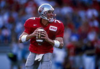 12 Sep 1998:  Quarterback Graham Leigh #7 of the New Mexico Lobos in action during a game agianst the Utah State Aggies at the University Stadium in Albuquerque, New Mexico. The Lobos defeated the Aggies 39-36.